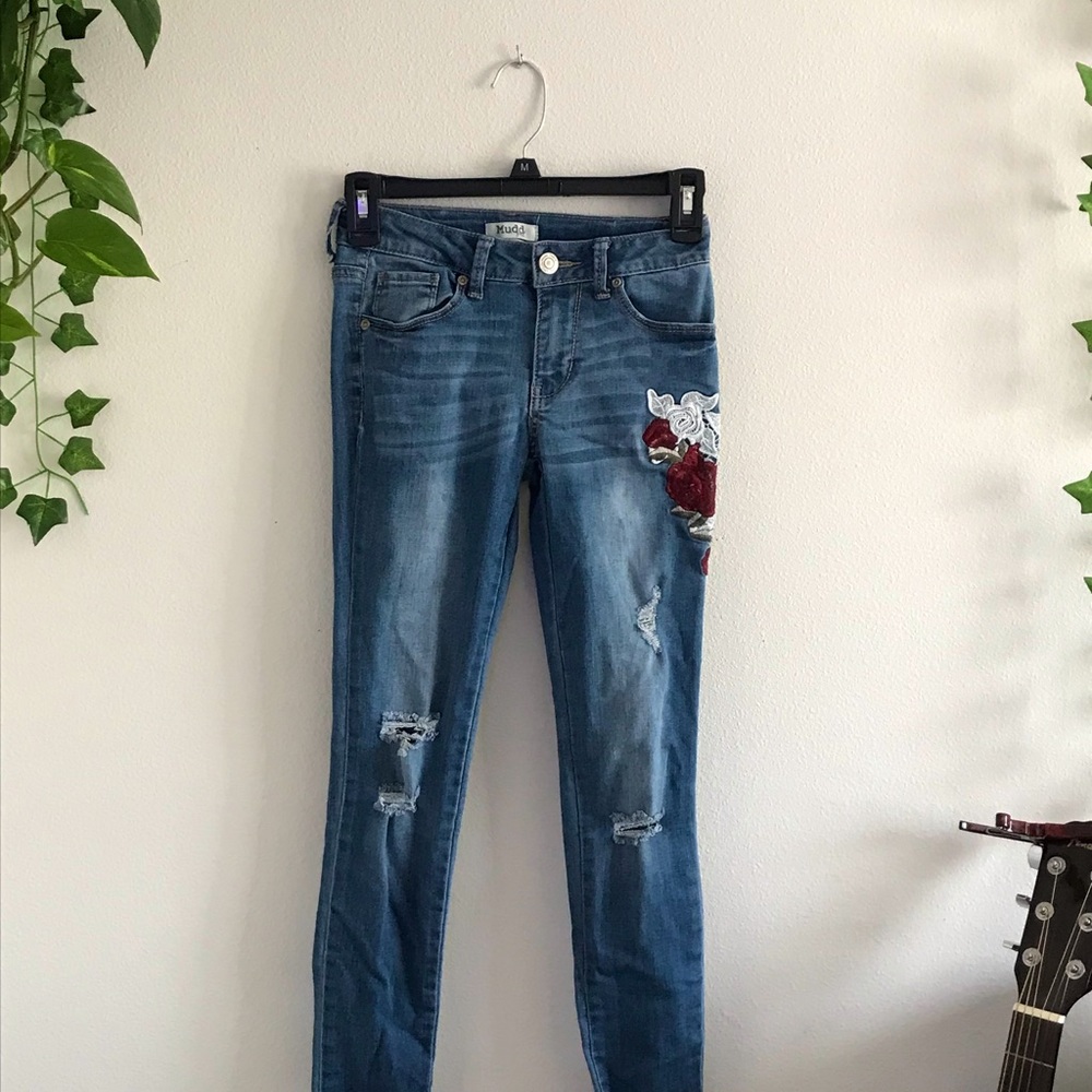 Ripped rose skinny jeans